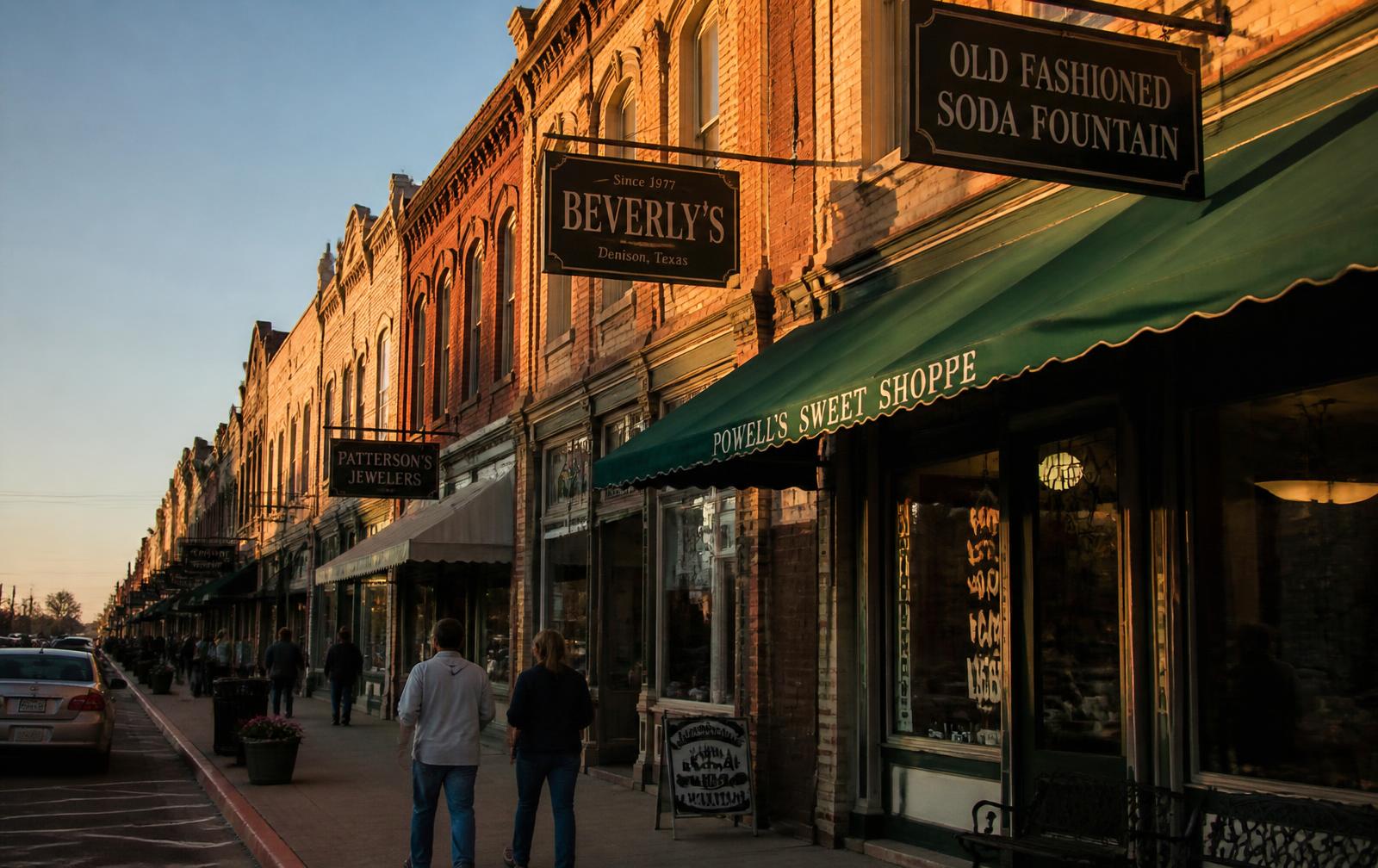 Historic brick storefronts on Main Street in downtown Denison, Texas